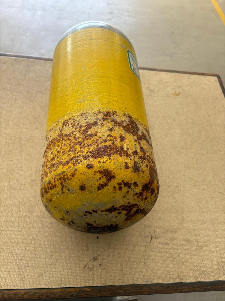 Rusted cylinder before sandblasting